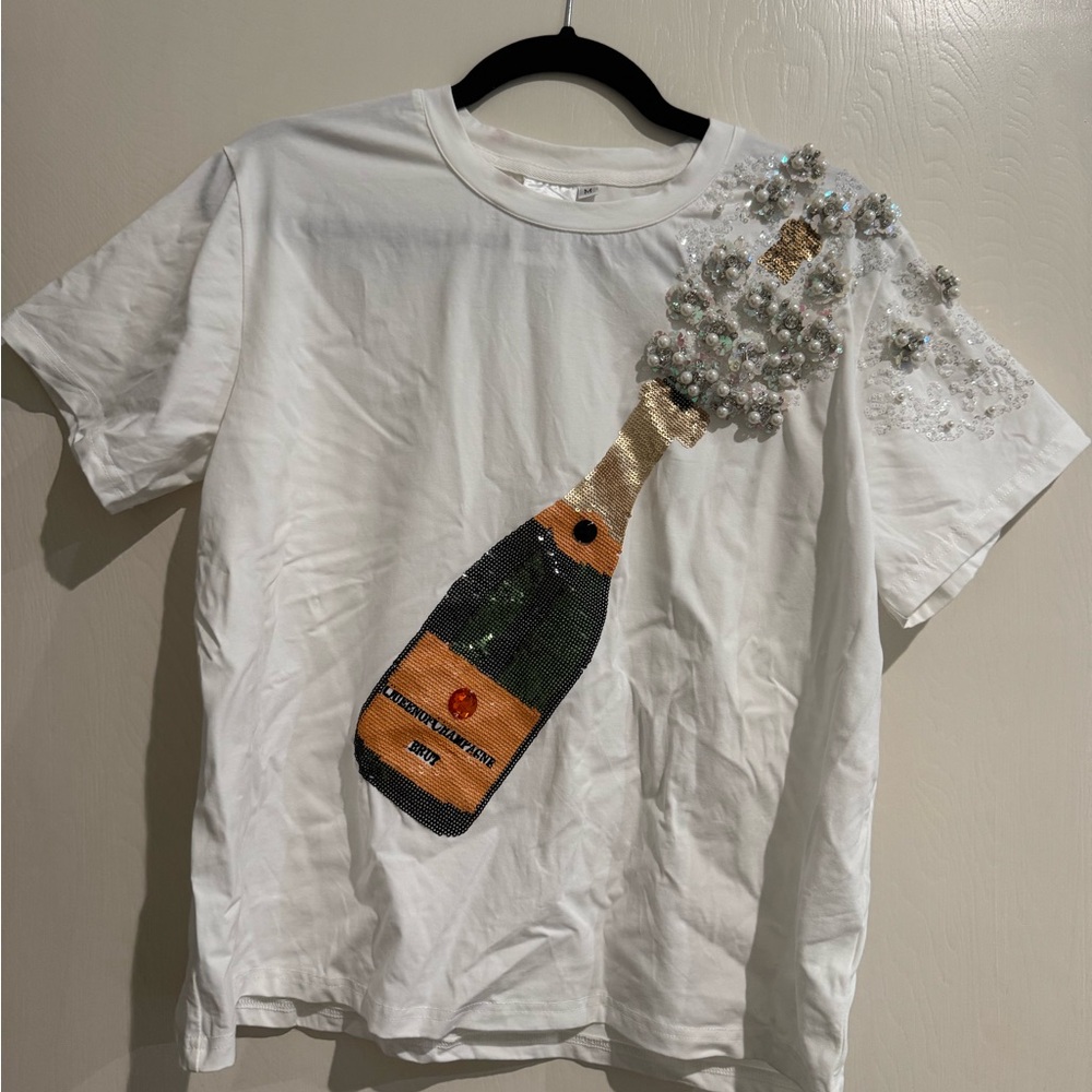 QUEEN OF SPARKLES White Short Sleeve Tee with Embellished Champagne Bottle